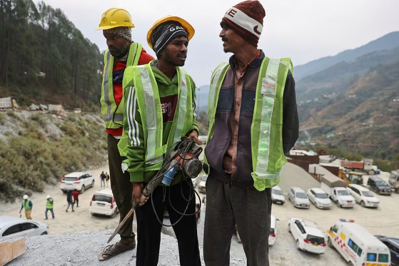 Rat miners stand before they begin manual drilling, in Uttarkashi in the northern state of Uttarakhand, India, November 27, 2023. PHOTO: REUTERS