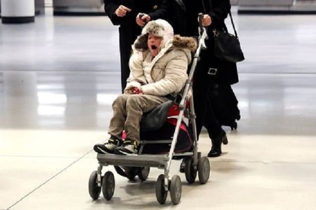 Alma Kashkooli, (12), from Iran who has a severe medical condition, is wheeled out of customs by her mother Farimeh Kashkooli who is living in the United States on a student Visa while studying at Fordham University Law School in New York, as Alma arrives at New York's John F Kennedy International Airport in New York after traveling from Istanbul Turkey February 6, 2017. PHOTO: REUTERS