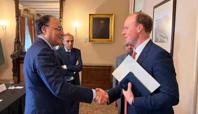minister for finance and revenue senator muhammad aurangzeb shakes hands withdeputy secretary at the united states department of the treasury francis brooke on the sidelines of the world bank imf spring meetings in washington dc photo x