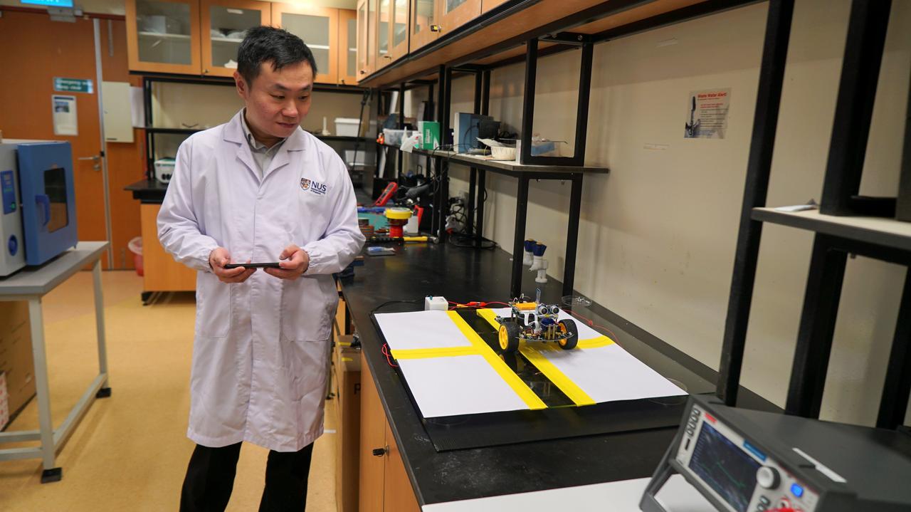 dr swee ching tan uses a remote controlled vehicle to test the shadow effect generator device at a lab in the national university of singapore june 26 2020 photo reuters