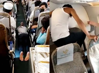 mid air scare man kicks window acts strangely on dubai bound pia flight