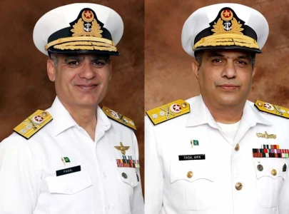two navy officers promoted to rank of rear admiral