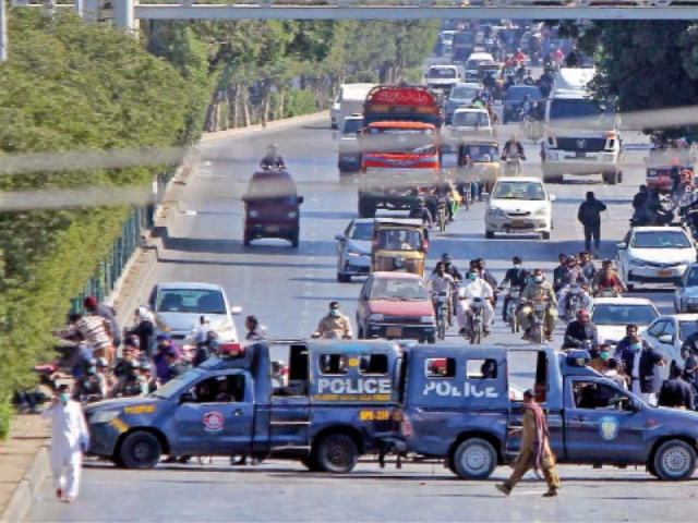 a road is closed for traffic amid sit ins against machh killings at over 20 locations in karachi photo ppi a road is closed for traffic amid sit ins against machh killings at over 20 locations in karachi photo ppi