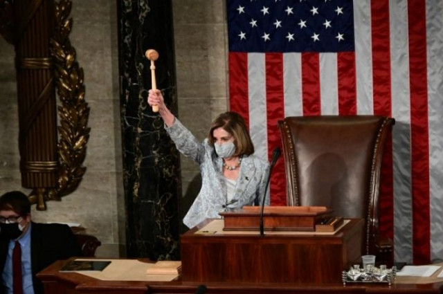 us speaker of the house nancy pelosi wielded the speaker s gavel after narrowly winning re election to the post afp us speaker of the house nancy pelosi wielded the speaker s gavel after narrowly winning re election to the post afp