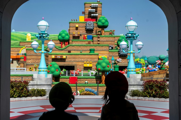 the attraction s colourful block like surroundings are straight out of the classic super mario games photo afp