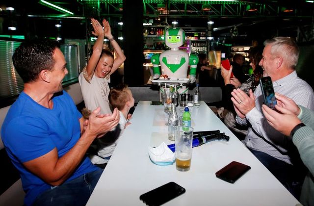 a robot delivers a birthday cake at robotazia restaurant as the coronavirus disease covid 19 outbreak continues in milton keynes britain october 2 2020 photo reuters