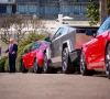 president donald trump accompanied by elon musk and musk s son speaks next to tesla vehicles on the south lawn of the white house in march 2025 getty images
