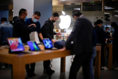 short queues in china as apple s newest iphone 12 hits stores