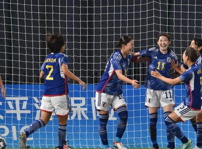 japan set up north korea football showdown