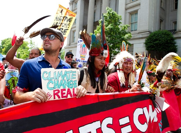 3 Actor Leonardo DiCaprio (L) marches march on Pennsylvania Avenue during the People's Climate March in Washington DC, on April, 29, 2017 Actor Leonardo DiCaprio (L) marches march on Pennsylvania Avenue during the People's Climate March in Washington DC, on April, 29, 2017. PHOTO: AFP