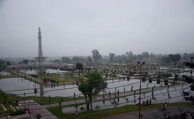 Stagnant rainwater made the Greater Iqbal Park look like a lake. PHOTO: Sajid Rana