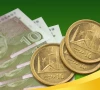 pakistani 10 rupees note against coins screengrab