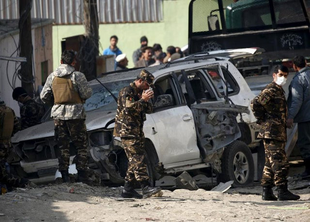 afghan security personnel keep watch at the site of a suicide blast that targeted a senior member of afghanistan 039 s election commission in kabul november 28 2015 photo reuters afghan security personnel keep watch at the site of a suicide blast that targeted a senior member of afghanistan 039 s election commission in kabul november 28 2015 photo reuters