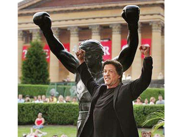 at the foot of the famed 72 rocky steps towers a 10 foot bronze statue of rocky balboa photo file at the foot of the famed 72 rocky steps towers a 10 foot bronze statue of rocky balboa photo file