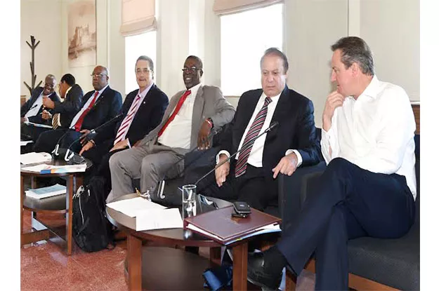 prime minister nawaz sharif and prime minister of the uk david cameron discussing a point during the chogm retreat session photo nni prime minister nawaz sharif and prime minister of the uk david cameron discussing a point during the chogm retreat session photo nni