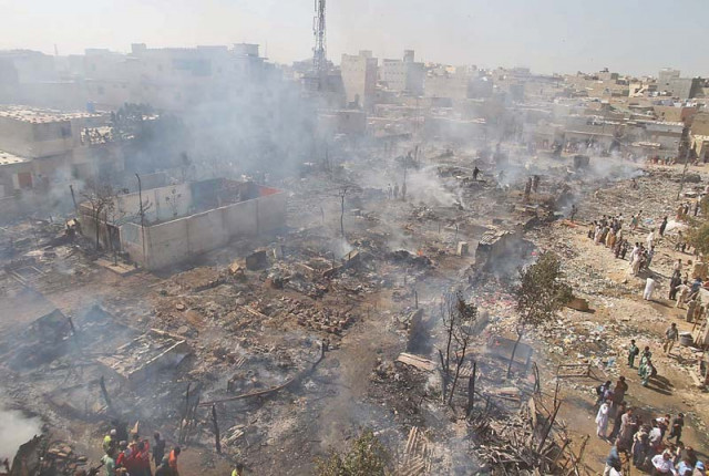 a view of a burnt slum located in junejo goth of mehmoodabad which is inhabited by minorities people belonging to the hindu community were living in this slum which was set on fire by unidentified men on november 5 photo file a view of a burnt slum located in junejo goth of mehmoodabad which is inhabited by minorities people belonging to the hindu community were living in this slum which was set on fire by unidentified men on november 5 photo file