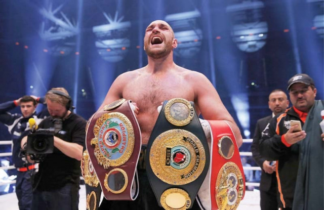 fury who was awarded the fight 115 112 115 112 116 111 on the judges scorecards captured the wba ibf ibo and wbo titles photo afp fury who was awarded the fight 115 112 115 112 116 111 on the judges scorecards captured the wba ibf ibo and wbo titles photo afp