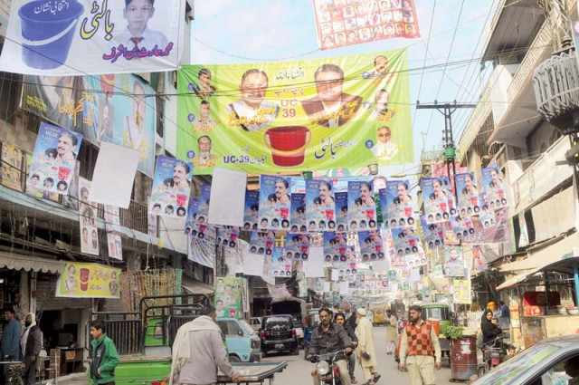 a bazaar in chittian hattian rawalpindi is completely covered with election posters photo agha mehroz express a bazaar in chittian hattian rawalpindi is completely covered with election posters photo agha mehroz express