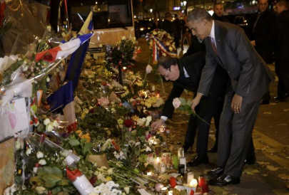 obama visits paris attack site pays tribute to victims