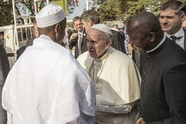pope francis c is greeted by central mosque leader nehedid tidjani l upon his arrival in the pk5 neighborhood on november 30 2015 in bangui photo afp pope francis c is greeted by central mosque leader nehedid tidjani l upon his arrival in the pk5 neighborhood on november 30 2015 in bangui photo afp