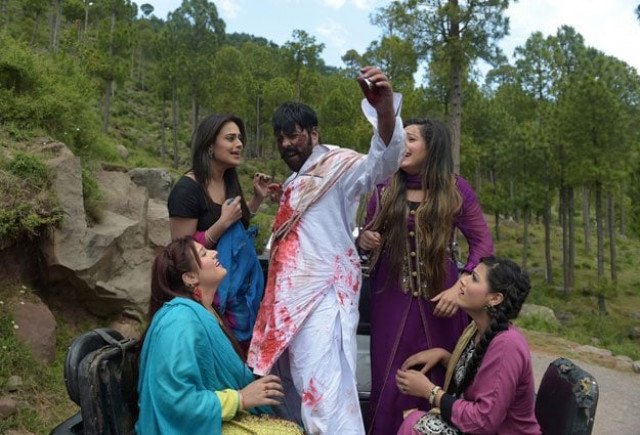 in this photograph taken on june 9 2015 pakistani actor shahid khan c takes part in the filming of a scene with actresses during the shooting of pashto film quot ma chera gharib sara quot don 039 t pester the poor in murree some 65kms north of islamabad photo afp in this photograph taken on june 9 2015 pakistani actor shahid khan c takes part in the filming of a scene with actresses during the shooting of pashto film quot ma chera gharib sara quot don 039 t pester the poor in murree some 65kms north of islamabad photo afp