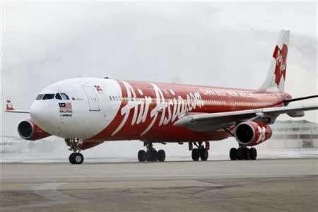 an airbus a340 airasia x passenger jet arrives on its inaugural flight photo reuters an airbus a340 airasia x passenger jet arrives on its inaugural flight photo reuters