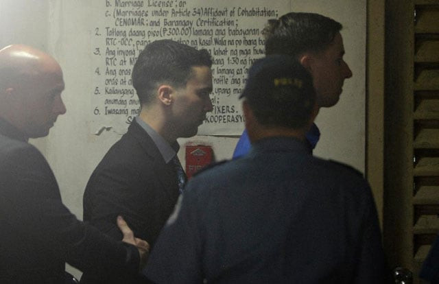 us marine private first class joseph scott pemberton c enters a court building to face the verdict of a murder case at the regional trial court in olongapo city on december 1 2015 photo afp us marine private first class joseph scott pemberton c enters a court building to face the verdict of a murder case at the regional trial court in olongapo city on december 1 2015 photo afp
