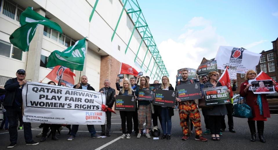 demonstrators march in edinburgh on june 5 2015 to call for change in qatar 039 s policies on working conditions for migrants in light of the increased construction of infastructure for the gulf state 039 s turn as host of the fifa world cup in 2022 photo afp