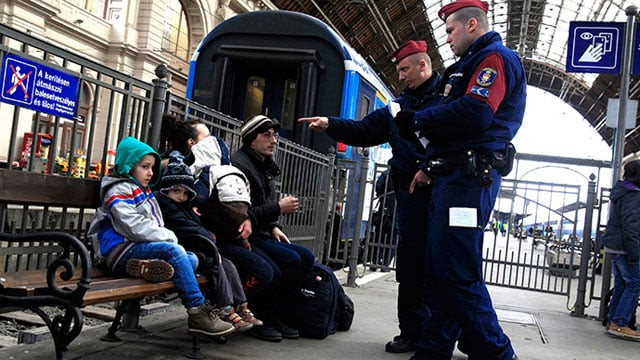 hungarian policemen check the documents of kosovars in keleti eastern railway station in budapest photo reuters hungarian policemen check the documents of kosovars in keleti eastern railway station in budapest photo reuters