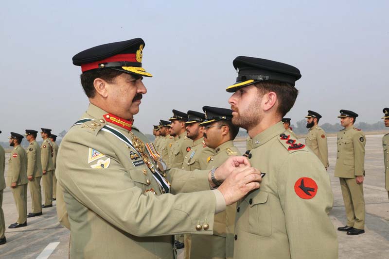 gen raheel awards a flying wing to a newly graduated aviation pilot photo ispr