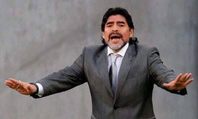 maradona sends roses to outgoing argentine leader maradona sends roses to outgoing argentine leader