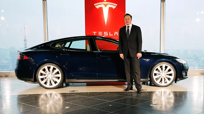 tesla motors inc chief executive elon musk poses with a tesla model s electric car photo reuters tesla motors inc chief executive elon musk poses with a tesla model s electric car photo reuters