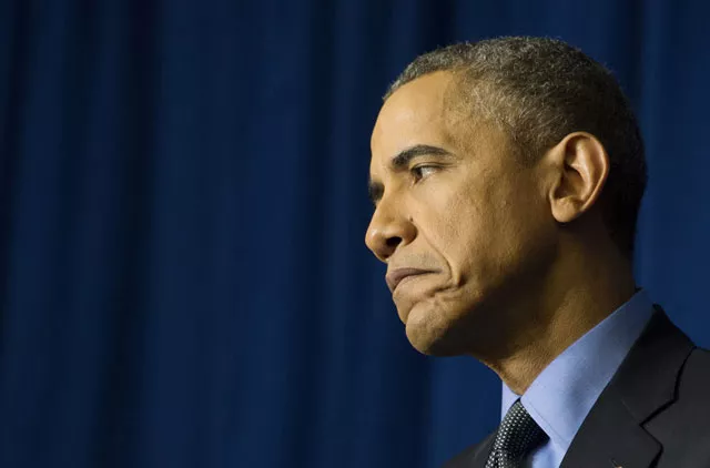 us president barack obama reacts during a press conference at the organization for economic co operation and development centre in paris on december 1 2015 photo afp us president barack obama reacts during a press conference at the organization for economic co operation and development centre in paris on december 1 2015 photo afp