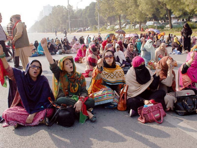 contractual teachers of different schools stage a sit in at d chowk on wednesday photo express contractual teachers of different schools stage a sit in at d chowk on wednesday photo express