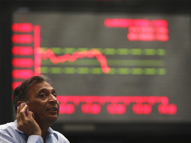 benchmark kse 100 index closes at 32 392 92 photo afp file