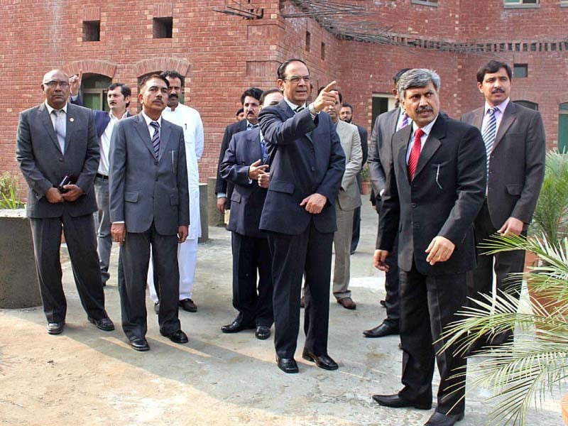 chairman nab qamar zaman chaudhry inspects a new building after inauguration at the nab lahore premises photo app