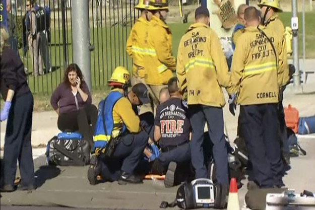 rescue crews tend to the injured in the intersection outside the inland regional center in san bernardino california in this still image taken from video december 2 2015 photo reuters