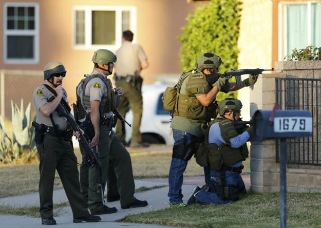 police officers conduct a manhunt after a mass shooting in san bernardino december 2 2015 photo reuters