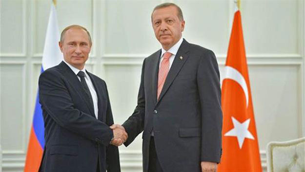 russian president vladimir putin l shakes hands with turkey 039 s president recep tayyip erdo an during their meeting in baku on june 13 2015 photo afp