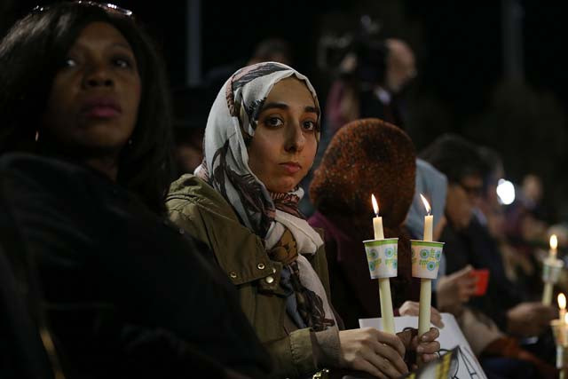san bernardino ca december 03 people hold candles as they attend a vigil at the san manuel stadium to remember those injured and killed during the shooting at the inland regional center were killed on december 3 2015 in san bernardino california police continue to investigate a mass shooting at the inland regional center in san bernardino that left at least 14 people dead and another 17 injured on december 2nd photo afp san bernardino ca december 03 people hold candles as they attend a vigil at the san manuel stadium to remember those injured and killed during the shooting at the inland regional center were killed on december 3 2015 in san bernardino california police continue to investigate a mass shooting at the inland regional center in san bernardino that left at least 14 people dead and another 17 injured on december 2nd photo afp