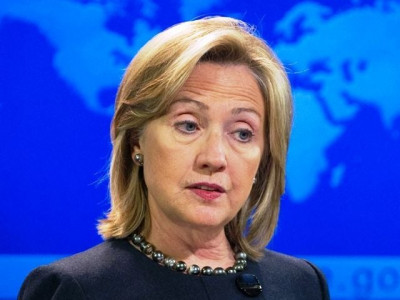 clinton vows to pursue extremists in air on ground in cyberspace