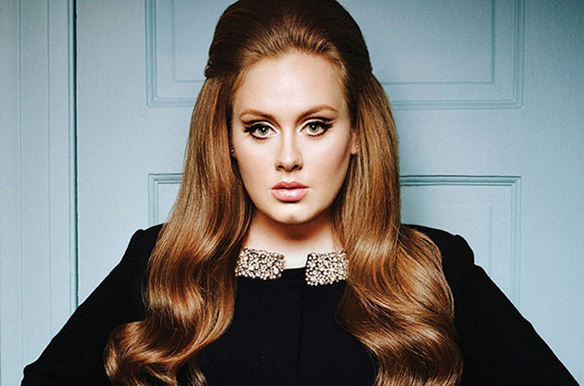 despite being inactive last year adele is still paying off her tax bills photo hercampus