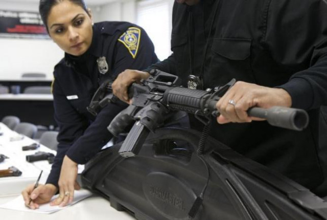 police personnel in the united states verifying a rifle registration photo reuters police personnel in the united states verifying a rifle registration photo reuters