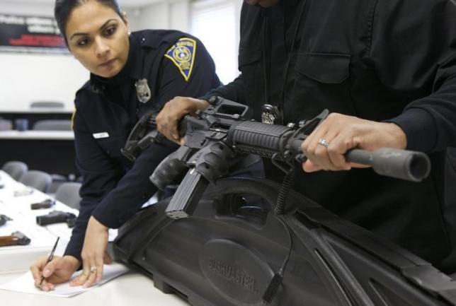 police personnel in the united states verifying a rifle registration photo reuters