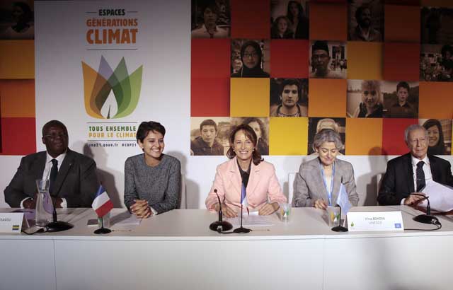 ltor florentin mossavou of gabon french ecology minister segolene royal and french education minister najat vallaud belkacem attend a meeting on actions of the banking sector for climate on december 4 2015 in le bourget near paris as part of the cop21 climate summit photo afp