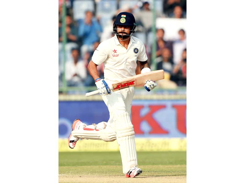 kohli partnered rahane 52 not out to cobble together the first century stand of the low scoring series after india had slumped to 57 4 following morne morkel s triple strikes photo afp