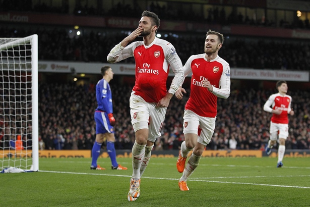 olivier giroud l celebrates scoring his team 039 s second goal during of the english premier league football match between arsenal and sunderland at the emirates stadium in london on december 5 2015 photo afp