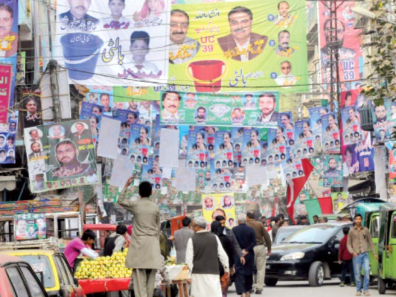 flyers and banners for various candidates fill the inner city streets of rawalpindi photo agha mehroz express