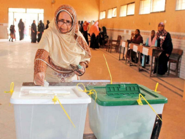 saturday s lg elections in six districts of karachi saw a large number of female voters determined to play a role in electing their local representatives photo athar khan express saturday s lg elections in six districts of karachi saw a large number of female voters determined to play a role in electing their local representatives photo athar khan express
