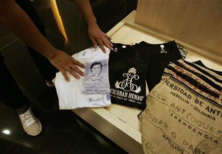 a salesperson puts on display shirts with pictures of late colombian cocaine kingpin pablo escobar photo reuters